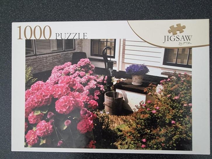 Legpuzzel 1000 stukjes. Onderwerp waterpomp in tuin, Hobby en Vrije tijd, Denksport en Puzzels, Zo goed als nieuw, Legpuzzel, 500 t/m 1500 stukjes