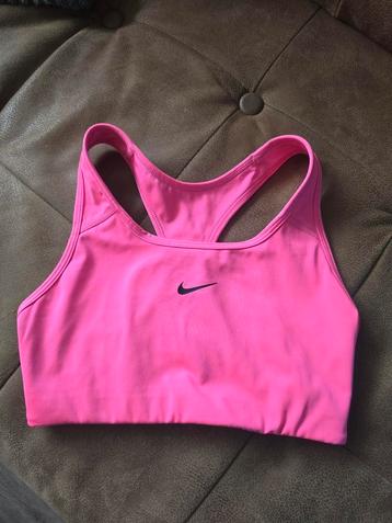 Nike sport topje in knalroze. beschikbaar voor biedingen