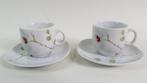 2x kop en schotel Bijenkorf Collection met Orchidee. 7A6, Tweedehands verkoop, Tweedehands verkoop, Gebruikt, Ophalen of Verzenden