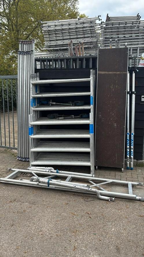 Nette ASC rolsteiger werkhoogte 10.2 meter zeer compleet, Doe-het-zelf en Verbouw, Steigers, Zo goed als nieuw, Rolsteiger of Kamersteiger