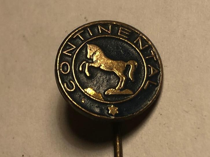 Metalen CONTINENTAL AUTOMERK Speld (Blauw/Messingkleur)., Verzamelen, Speldjes, Pins en Buttons, Zo goed als nieuw, Speldje of Pin