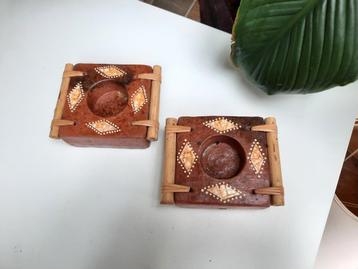 2 stenen kandelaars beschikbaar voor biedingen