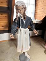 Antieke etalage pop, Ophalen