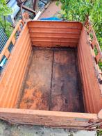 Oude ijzeren bak met uitklapbare bodem, Ophalen