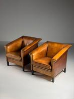 Grote collectie schapenleren fauteuils en banken