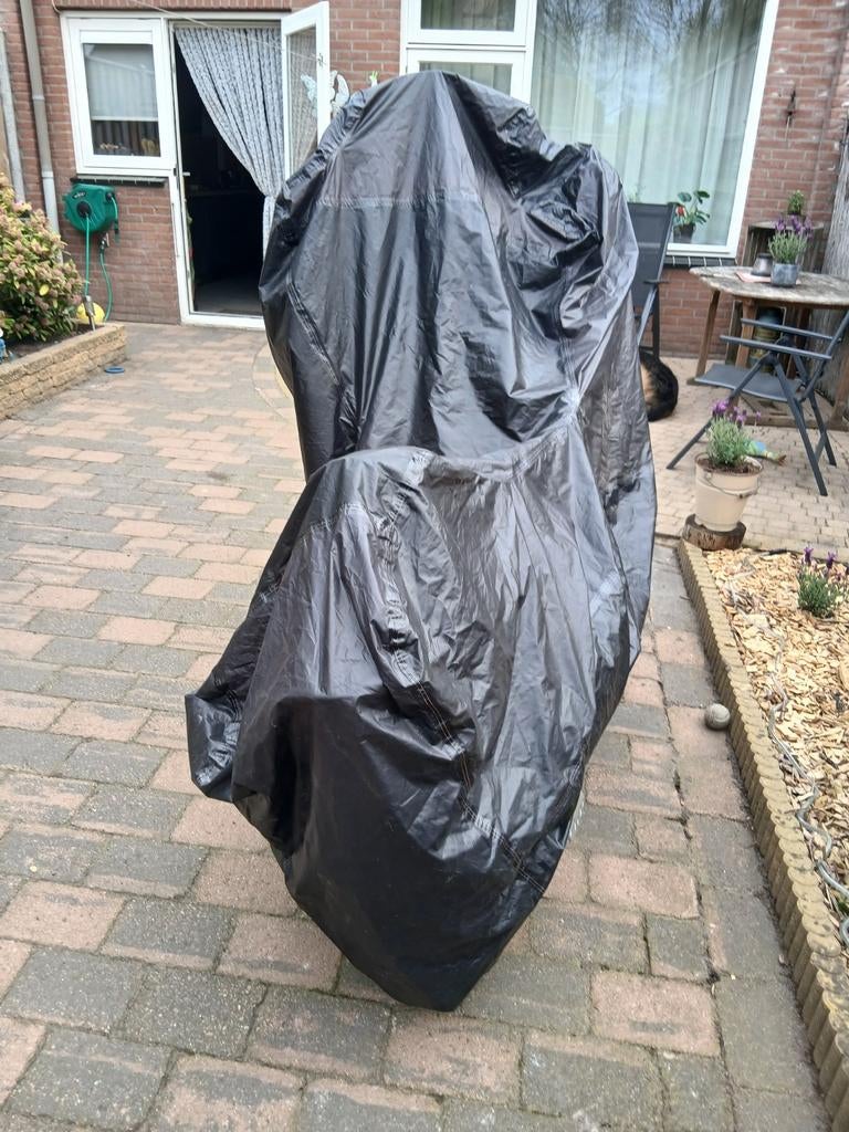 Zwarte hoes voor motor of scooter, Ophalen