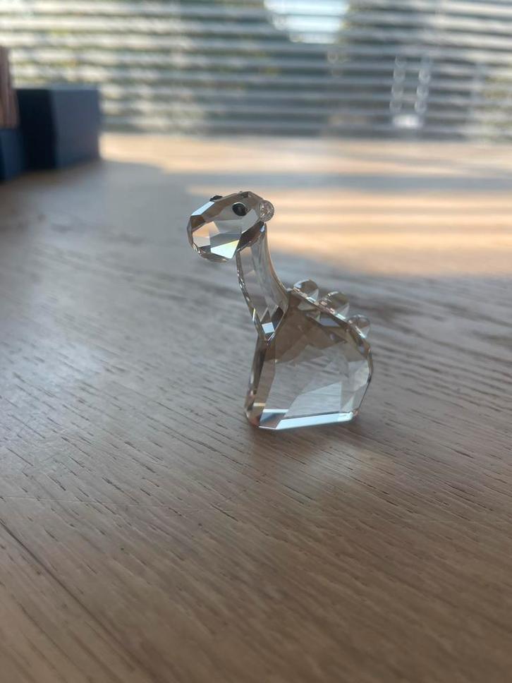 Swarovski dino 832181, Verzamelen, Beelden en Beeldjes, Zo goed als nieuw, Dier, Ophalen