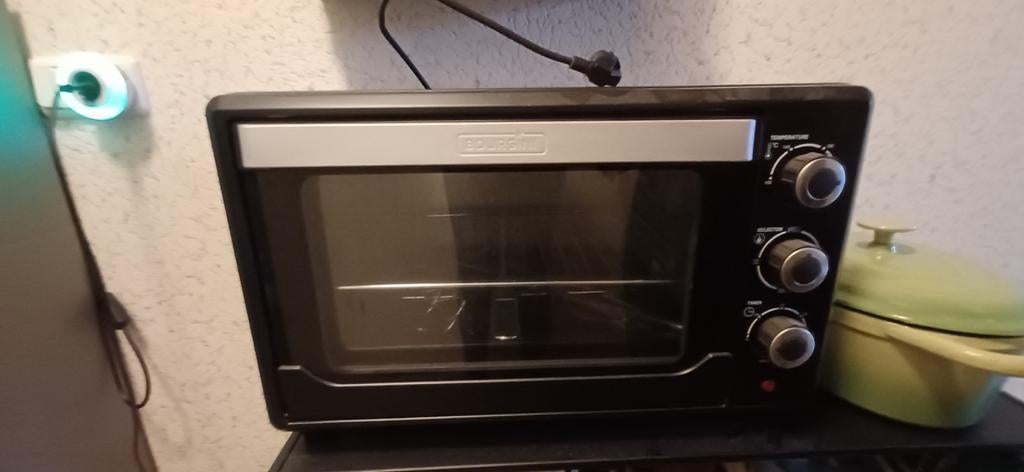 Compacte ovengril Bourgini, Ophalen