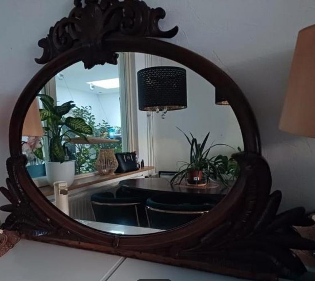 Ovale spiegel met houtsnijwerk, Ophalen