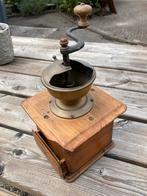 Antieke koffie molen, Ophalen