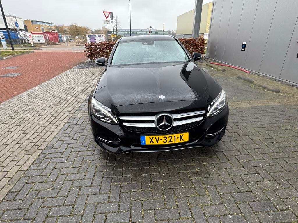 Mercedes-Benz C-Klasse C180 1.6 115KW Aut7 2014 Zwart, Auto's, Mercedes-Benz, Automaat, 1800 kg, Zwart, Zwart