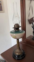 Antieke petroleum lamp, Ophalen