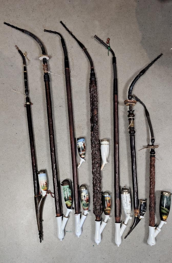 7 antieke pijpen en 2 losse porseleinen pijpenkoppen, Ophalen