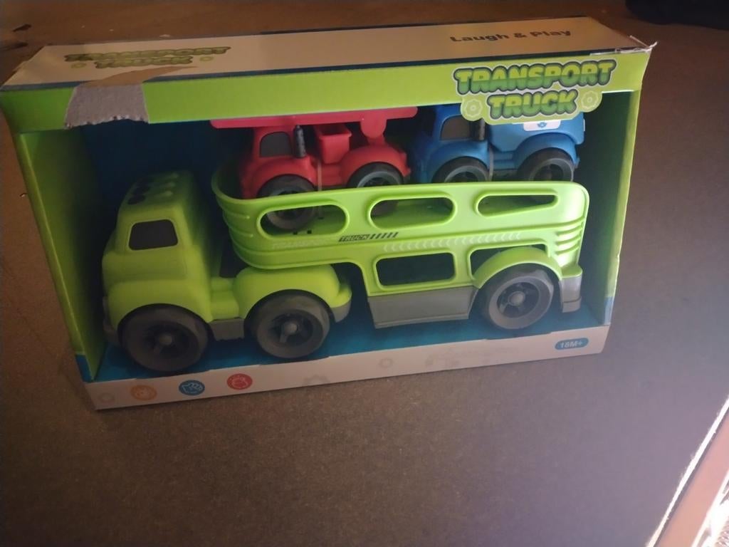 Kinderspeelgoed transporter met werkvoertuigen, Ophalen