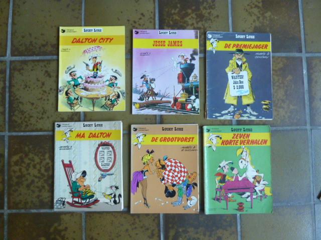 Lucky Luke - 12 stuks - Dargaud presenteert, Boeken, Stripboeken, Gelezen, Meerdere stripboeken, Ophalen