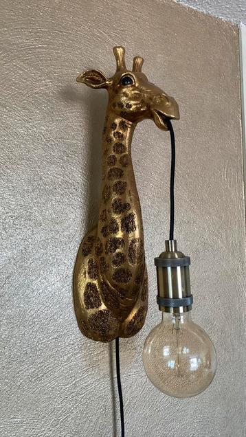 giraf wandlamp light en living 