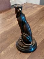 Bronzen beeld van een zittende panter., Antiek en Kunst, Ophalen of Verzenden