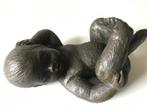 Te koop mooi beeldje van een liggend kindje., Ophalen of Verzenden, Zo goed als nieuw