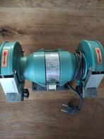 Kinzo slijpmachine, Ophalen