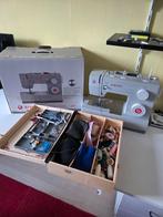 Singer naaimachine met toebehoren, Ophalen