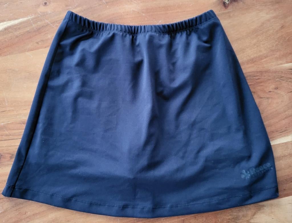 NIEUW Donkerblauw Reece hockeyrokje, maat XS, Sport en Fitness, Hockey, Ophalen, Nieuw, Kleding