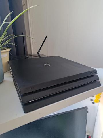 Playstation 4 Pro - 2TB + 2 controllers + games beschikbaar voor biedingen
