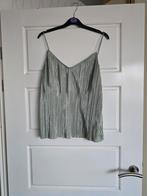 Te koop groene damestop, maat M, merk H&M., Kleding | Dames, Tops, Maat 38/40 (M), H&M, Ophalen of Verzenden, Zo goed als nieuw