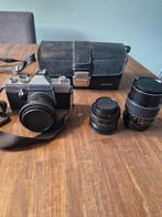 Prachtige praktica tl1000 super met 3 pentacon lenzen, Audio, Tv en Foto, Fotocamera's Analoog, Ophalen of Verzenden, Zo goed als nieuw