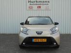 Toyota Aygo X 1.0 VVT-i AUTOMAAT PULSE CAMERA CARPLAY ENZ..., Stof, Gebruikt, Bruin, 4 stoelen