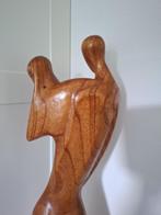 Houten beeld, Ophalen