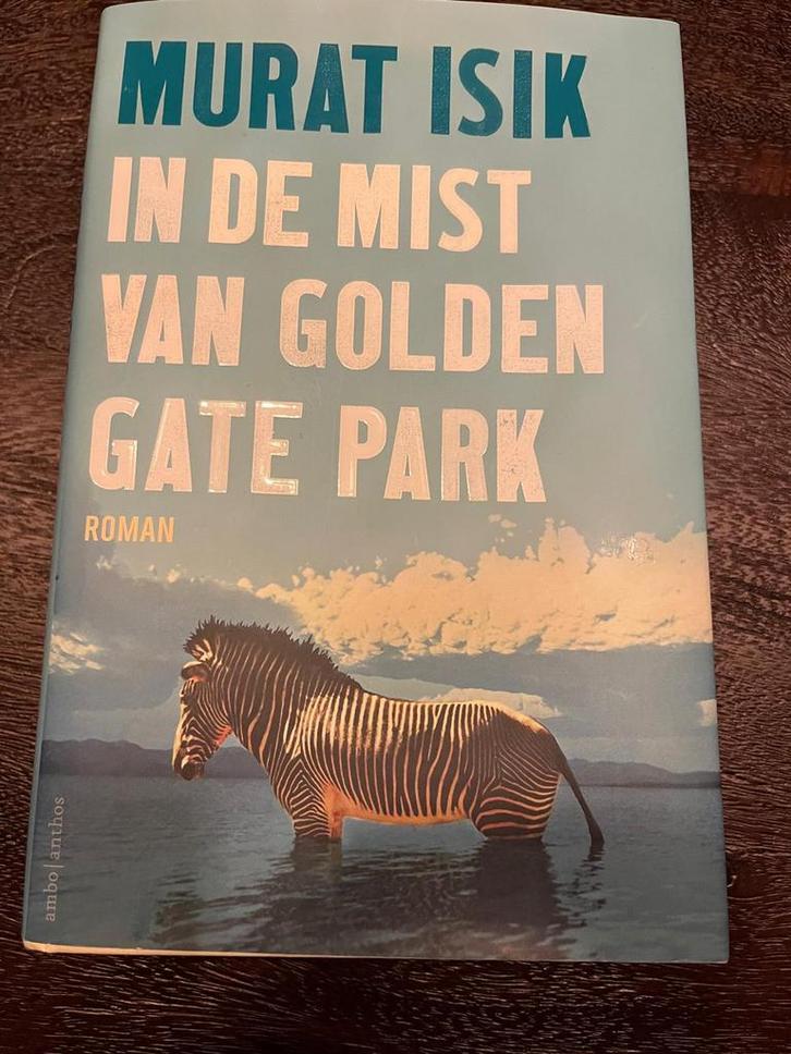 Murat Isik - In de mist van Golden Gate Park, Boeken, Literatuur, Zo goed als nieuw, Amerika, Ophalen of Verzenden