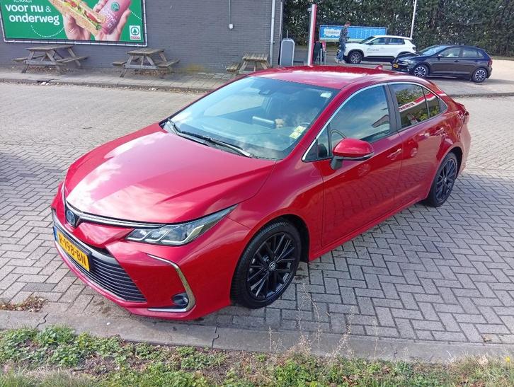 Toyota Corolla 1.8 Hybrid 122pk CVT 2022 Rood, Auto's, Toyota, Particulier, Corolla, ABS, Achteruitrijcamera, Adaptive Cruise Control