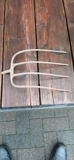 Te koop mestgreep zonder steel, Ophalen
