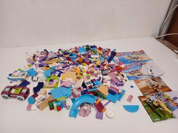 Leuke hoeveelheid lego friends met boekjes beschikbaar voor biedingen