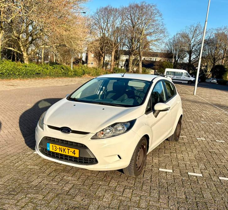 Ford Fiësta 1.25 44KW 5DR 2010 Wit, Auto's, Ford, Particulier, Fiësta, Airconditioning, Centrale vergrendeling, Elektrische ramen