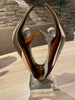 Murano glazen beeld, Ophalen