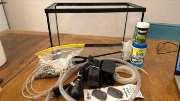 Compleet aquarium met heater, zuurstof, pomp en net  beschikbaar voor biedingen
