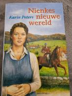 Nienkes nieuwe wereld - Karin Peters, Boeken, Ophalen of Verzenden, Zo goed als nieuw, Karin Peters, Nederland
