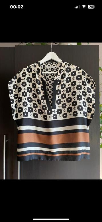 Summum top S/M beschikbaar voor biedingen