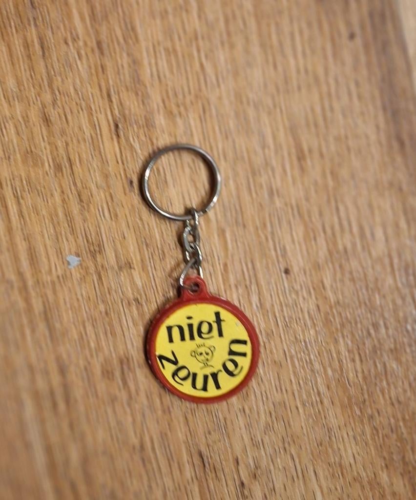 Niet zeuren sleutelhanger van Eru, Ophalen of Verzenden, Gebruikt, Overige typen