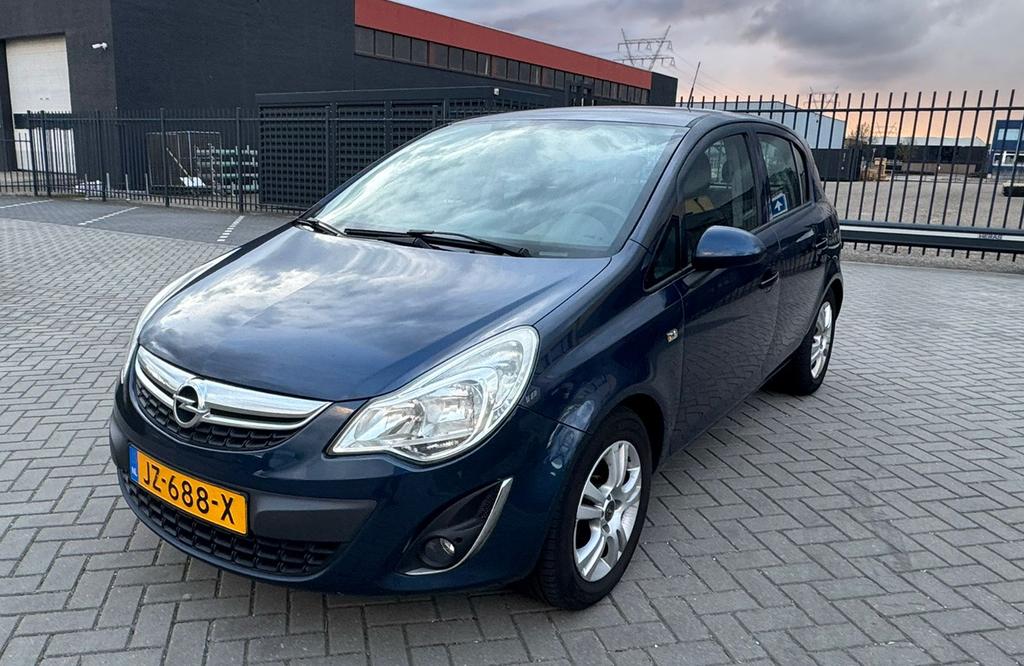 Opel Corsa 1.2 16V Anniversary Edition 2011 Airco Trekhaak, Auto's, Voorwielaandrijving, Zwart, 4 cilinders, Blauw