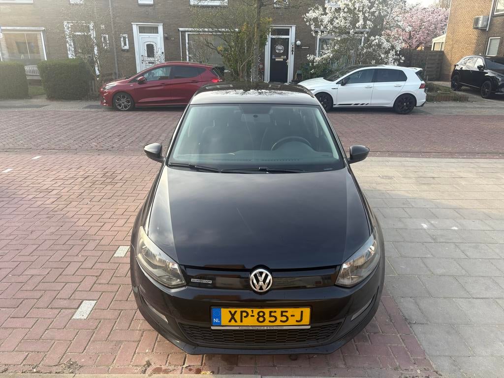 Volkswagen Polo 1.6 diesel TDI 55KW 2010 Zwart, Auto's, Voorwielaandrijving, Stof, 74 pk, 1057 kg