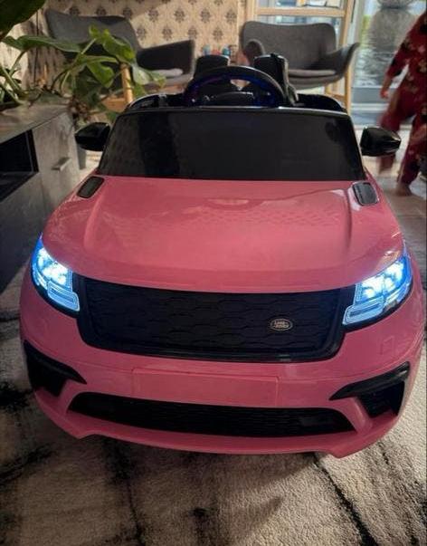 Roze elektrische kinderauto Range Rover Velar, Kinderen en Baby's, Speelgoed | Buiten | Accuvoertuigen, Ophalen of Verzenden, Gebruikt