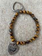 Armband van tijgeroog kralen en zilveren bedels., Met edelsteen, Bruin, Nieuw, Ophalen of Verzenden