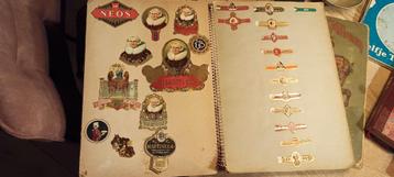 Twee plakboeken vol sigarenbandjes beschikbaar voor biedingen