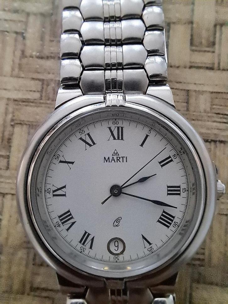 Vintage Marti horloge met dagaanduiding, Sieraden, Tassen en Uiterlijk, Horloges | Dames, Gebruikt, Overige merken, Staal, Ophalen of Verzenden