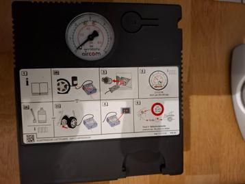 compressor met bandendicht middel beschikbaar voor biedingen