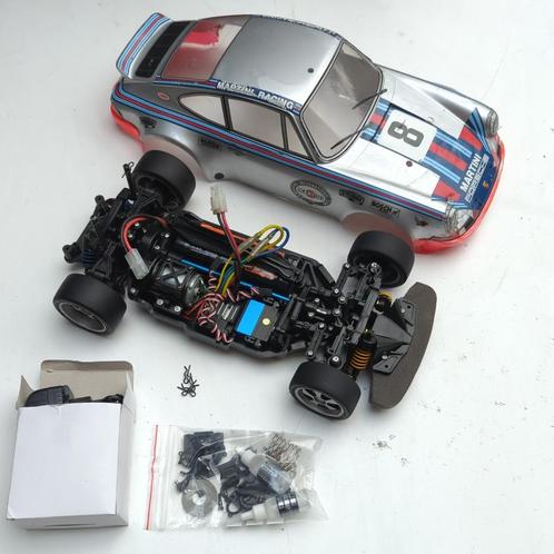Tamiya TT-02 Porsche Carrera RSR + opties, accu & lader, Hobby en Vrije tijd, Modelbouw | Radiografisch | Auto's, Gebruikt, Auto onroad