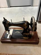 Naaimachine antiek, Ophalen