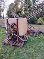 Twee giertank banden en een veldspuit., Ophalen